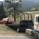 West Vail Shell Helping police tow a car