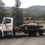 West Vail Shell towing jeep